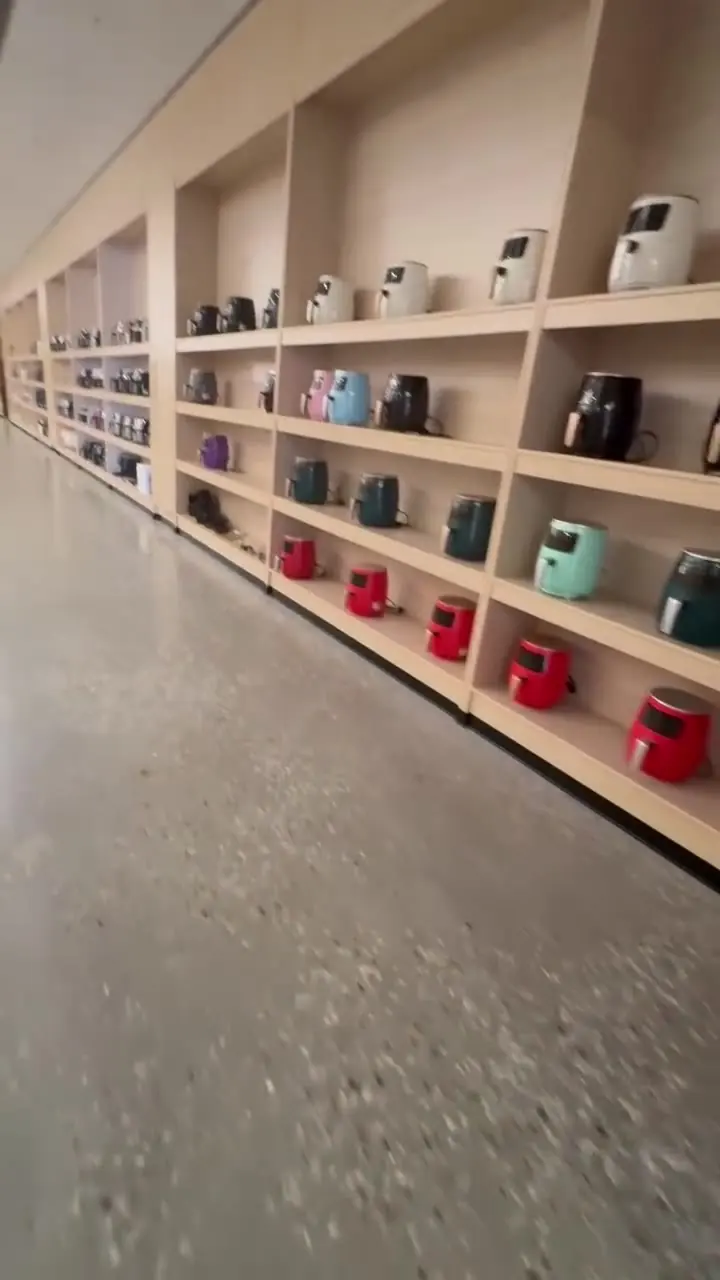 Multi-category small appliance showroom used for model and sourcing discussions